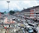 Vehicles ply on roads as normal life resumes in the Kashmir valley after ten days of curfew at Lal Chowk in Srinagar on Sunday. PTI