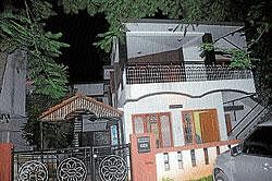 dwelling: Ananthu couple was living at the first floor of this house on Udayaravi road in Kuvempunagar in Mysore.  dh photo