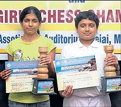 Mysores Girish A  Koushik (right) and Mangalores Vanessa DSouza with the State sub-junior title on Tuesday.
