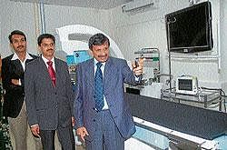 making a POINT: Director, Sri Jayadeva Institute of Cardiovascular Science and Research, Dr C N Manjunath making a point, while explaining about a facility, in Mysore on Wednesday. Dr Sadananda and Dr Harsha Basappa look on. DH PHOTO