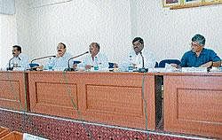 Meet: ZP president Muniraju speaking at the KDP meeting in Chamarajnagar on Wednesday. Joint secretary Shankar Raju, CEO Sundar Nayak, Vice-president Shivakumar are seen. DH Photo