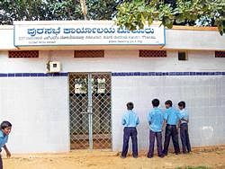 EASY ALTERNATIVE: Sulabha Shouchalayas were constructed years back in four major places in Malur, funded by the SFI. But, since the toilet is forever closed and locked, students of the Junior College often urinate on its walls.  DH PHOTO