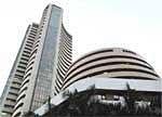 Sensex closes volatile day on a flat note