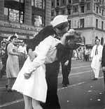 In this August 14, 1945, picture, a sailor and a nurse kiss in Times Square during celebrations for the end of WW II. AP