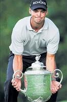 Too heavy: Germanys Martin Kaymer with the Wanamaker Trophy. AFP