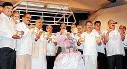 District- in-Charge Minister Krishna J Palemar releasing Shubham milk in Mangalore.