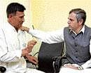 Abdul Ahad Jan meets J &K Chief Minister Omar Abdullah before his release on Tuesday. PTI