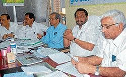 Minister for Cooperation Lakshmana S Savadi at a review meeting, in Mysore on Wednesday. Dh Photo
