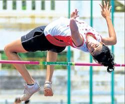 Soaring high: Karnatakas Srishti Sunil wins the girls under-18 high jump gold at the South Zone junior athletics championships at the Sree Kanteerava Stadium on Thursday. DH Photo