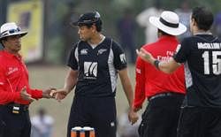 Whats that? Kiwi skipper Ross Taylor (second from left) and team-mate Nathan McCullum (right) make their displeasure clear to umpires Asad Rauf (left) and Tyron Wijewardena. AP