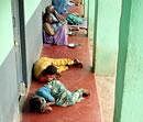 Residents seen at Beggars Rehabilitation Centre on Magadi Road in Bangalore on Friday as many of them left the centre. --KPN