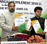 Commerce and Industry Minister Anand Sharma (L)with MoS Jyotiraditya Scindia releasing the Annual Supplement (2010-2011) to the Foreign Trade Policy (2009-2014) in New Delhi