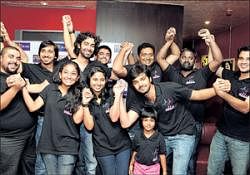 Geared up: The cast and crew of Inidhu Inidhu.