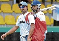 Under Pressure: Suresh Raina (left) and Rohit Sharma need to get their act together. AFP