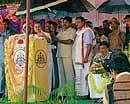 Home Minister Dr V S Acharya speaking after inaugurating a new police station at Javagal in Arsikere taluk on Wednesday. Dh photo