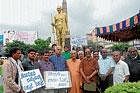 Members of Save University Forum staging a protest in front of the Mahatma Gandhijis statue, in Mysore on Thursday. Prof Champa, Prof Lohithashwa, Prof Bhagawan are seen. Dh Photo