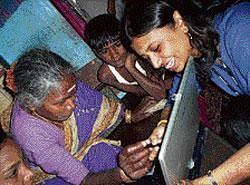 Indrani Medhi taking computer literacy to a remote village.