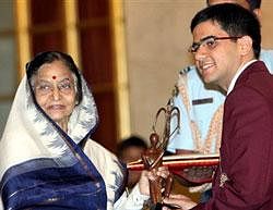 President Pratibha Patil presents the Arjuna Award for the year 2010 to chess player Parimrajan Negi during a function at Rashtrapati Bhavan in New Delhi on Sunday. PTI