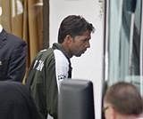 Pakistan's cricket player Mohammad Asif leaves the team hotel in London on  Monday. AP