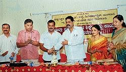 Zilla Panchayat President Santhosh Kumar Bhandary inaugurating the district-level conference on RTE Act at the DIET in Mangalore on Tuesday.