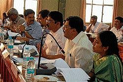 District In-charge Minister R Ashok, Women and Child Welfare Minister P M Narendraswamy, ZP President Leelavathy, Deputy Commissioner P C Jaffer Sharieff, ZP CEO Jayaram and others at the review meeting held in Mandya on Tuesday. DH Photo