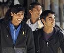 Pakistan cricket players Mohammad Amir, left, Salman Butt, right, and Mohammad Asif walk to a taxi as they leave their hotel in Taunton, England on Wednesday. AP