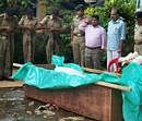 Policemen give the guard of honour to their slain colleauge Lucas Tete after he was killed by Maoists, in Lakhisarai, Bihar, on Friday. PTI