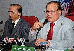 MRPL Chairman R S Sharma (right) addressing a press meet in Mangalore on Saturday. MD U K Basu looks on.