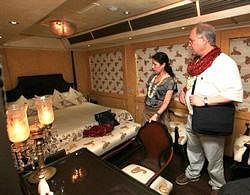 Foreigners admire the interiors of the new luxury train Royal Rajasthan on Wheels during its inauguration in New Delhi on Sunday. PTI
