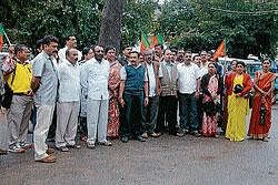 BJP workers staging a protest urging the President of India Pratibha Patel to give assent to the Anti-Cow Slaughter Bill, in front of the DCs Office in Madikeri on Monday.