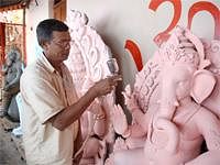 Appu Pal, an artisan from Kolkata, has been coming to Hubli for the past 18 years to make Ganesha idols. IANS