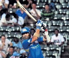 Mumbai Indians skipper Sachin Tendulkar drives majestically during his sparkling 69 in the Champions League opener against Highveld Lions on Friday.  AP
