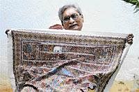Intricate Stories: Padma Shri artist J Guruappa Chetty with his work.