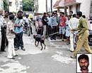 Dog squad pressed into action at the house of Samuel (Inset) in Michaelpalya, Indiranagar on Monday. DH Photos
