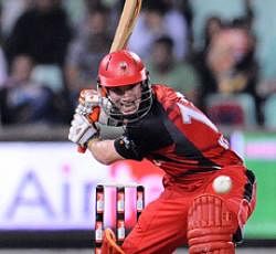 Red fury: South Australian Redbacks Daniel Harris en route to his half-century against Mumbai Indians in the Champions League tie in Durban on Tuesday. AFP