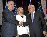 Crucial Meet: US Secretary of State Hillary Rodham Clinton looks on as Palestinian President Mahmoud Abbas (right) and  Israeli Prime Minister Benjamin Netanyahu shake hands in Sharm El-Sheikh on Tuesday during the second round of Middle East  peace talks. AFP