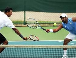 Tennis players Leander Paes and Mahesh Bhupathi during a practice session ahead of the September 17-19 Davis Cup World Group play-off against Brazil, at SDAT Tennis Stadium in Chennai on Wednesday. PTI