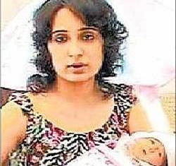 Gursimran Kaur with her new-born child Inayat.