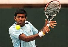 Rohan Bopanna plays a return to Brazilian opponent Thomaz Bellucci during their singles match for the Davis Cup World Group play-off tie between India and Brazil  in Chennai on Friday. AFP