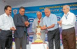 Retired Senior Deputy Director General, Ministry of Communications, N S Chakravarthy inaugurating Aakar-2010 in Mysore on Friday. NIE president, S R Subba Rao, principal, Dr M S Shivakumar, staff advisor, Sadashivamurthy, and HoD, Civil, Dr Suresh look on. DH PHOTO