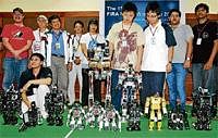 Man & Machine: Participants of Humanoid Robot HuroCup MiroSot computation at FIRA Robot World Cup-2010 in Bangalore on Sunday. Dh Photo