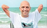 Man of the moment: French amputee and swimmer Philippe Croizon poses in Wissant, northern France, on Monday after he succeeded in his attempt to swim the English Channel. AFP