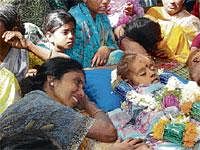 Inconsolable: Chandrakala grieves the death of her son in Nagendra in Bilikere, Hunsur, on Monday. DH Photo