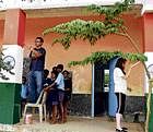 A team of American students paint the Government Higher Primary School in Muttur, Shidlaghatta. dh photo