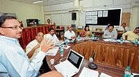 A technical expert explaining Mangala Corniche project at a meeting in Deputy Commissioners office on Tuesday.  DH photo