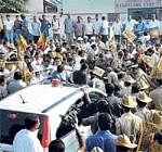 High Drama: Supporters of Minister Aravind Limbavali gheraoed the Chief Ministers  car on Race Course Road in Bangalore on Tuesday, after the minister was dropped from the State Cabinet. KPN