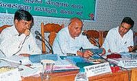 Loksabha member former prime minister H D Devegowda speaking at a  review meeting at ZP, in Hassan on Wednesday. DC Naveen Raj SIngh is seen. DH Photo
