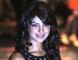 Bollywood actress Priyanka Chopra poses for photographers before attending a fashion show by Indian designer Manish Malhotra on the fourth day of Lakme Fashion Week (LFW) Winter/Festive 2010 in Mumbai on September 20, 2010. The LFW, held twice annually and now in its eleventh year, features creations by over 70 designers and will culminate with a grand finale on September 21. AFP