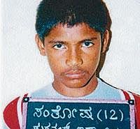 The photograph of Nagaraja taken at the age of 12 by the Surathkal police violating the JJ Act 2000.