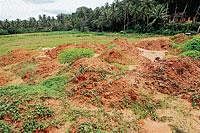 A view of the land identified for the proposed bus stand at Pumpwell. DH photos/Chandrahas Kotekar